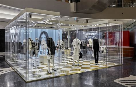 centro commerciale con pavimento a scacchi scritto prada|Prada Gallery .